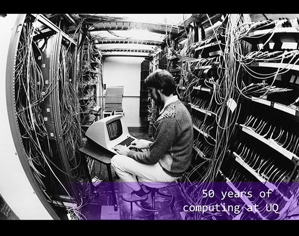 Man using first computer at UQ