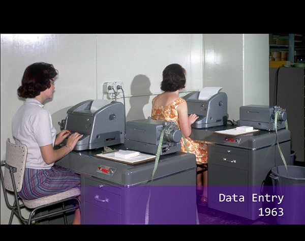 two women performing data entry at UQ in 1963